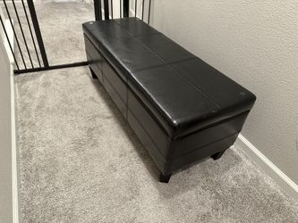 black storage ottoman