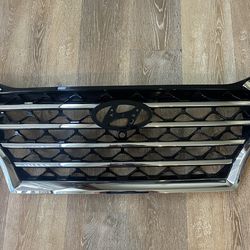 2019-2022 HYUNDAI TUCSON FRONT UPPER GRILLE GRILL OEM WITH CAMERA HOLE