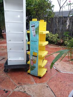 Neutrogena  branded retail floor display unit for sun care products. This point-of-purchase (POP) display is specifically designed to hold and showcas