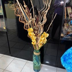 Vase Full of floral Decorations $25