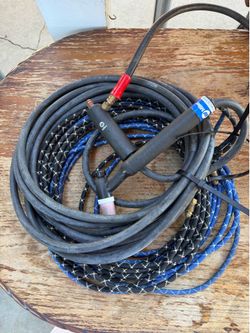 Welding torch with hose