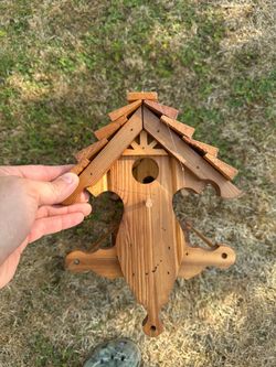Handmade Cedar decorative bird feeder.
