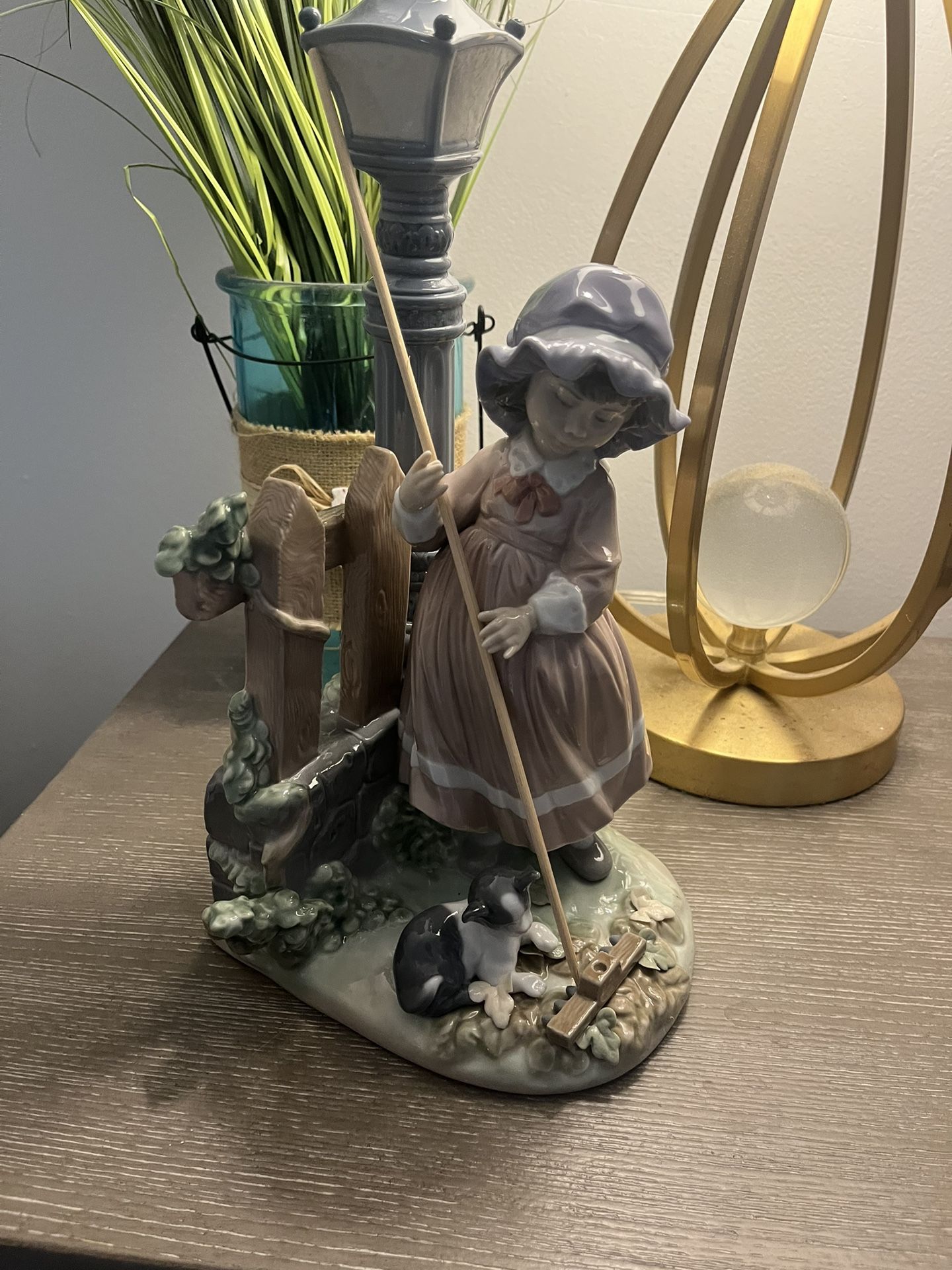 Lladro Girl Raking Leaves