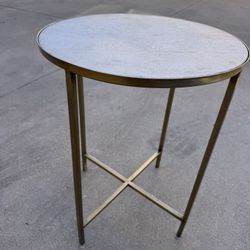 White marble looking small round side table