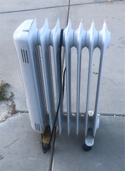 white Duracraft radiator heater