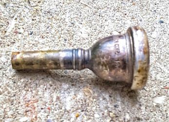 Trombone mouthpiece only marked with a name and numbered 12c