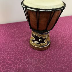 mini djembe drum with a painted gecko design