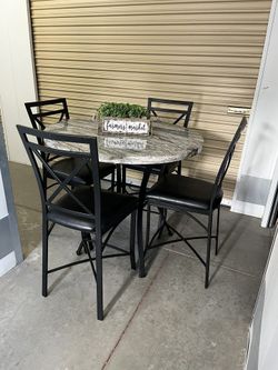 Brand New Table And 4 Chairs