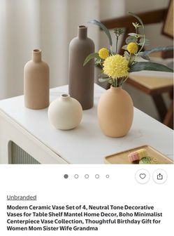Set of four vases, brand new