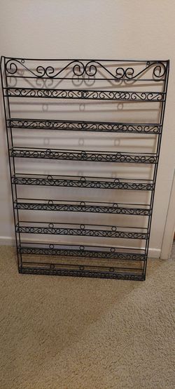 Wall mounted nail polish rack