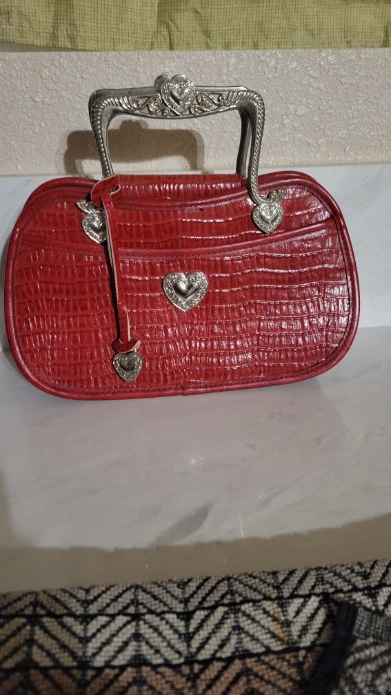 Red Purse With Silver Decor.