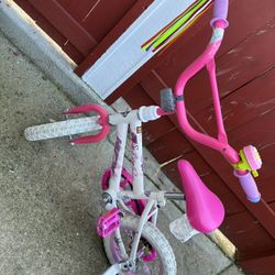 Pink toddler bike