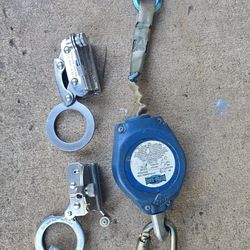 Retractable Fall Arrest Device And It's Connection Devices.
