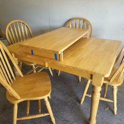 Dining Table with 4 chairs and an extension