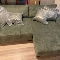 BRAND NEW!!! green corduroy couch with chase