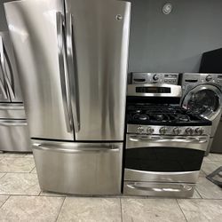 GE french door refrigerator &. GE 5 burner gas range set steel