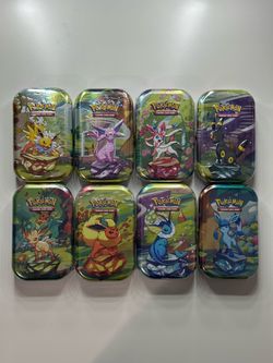 Prismatic Evolution Tins
