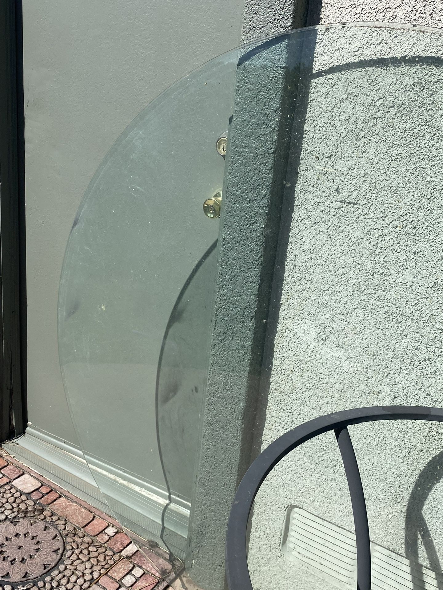 Round Glass Dining Table with Black Metal Frame