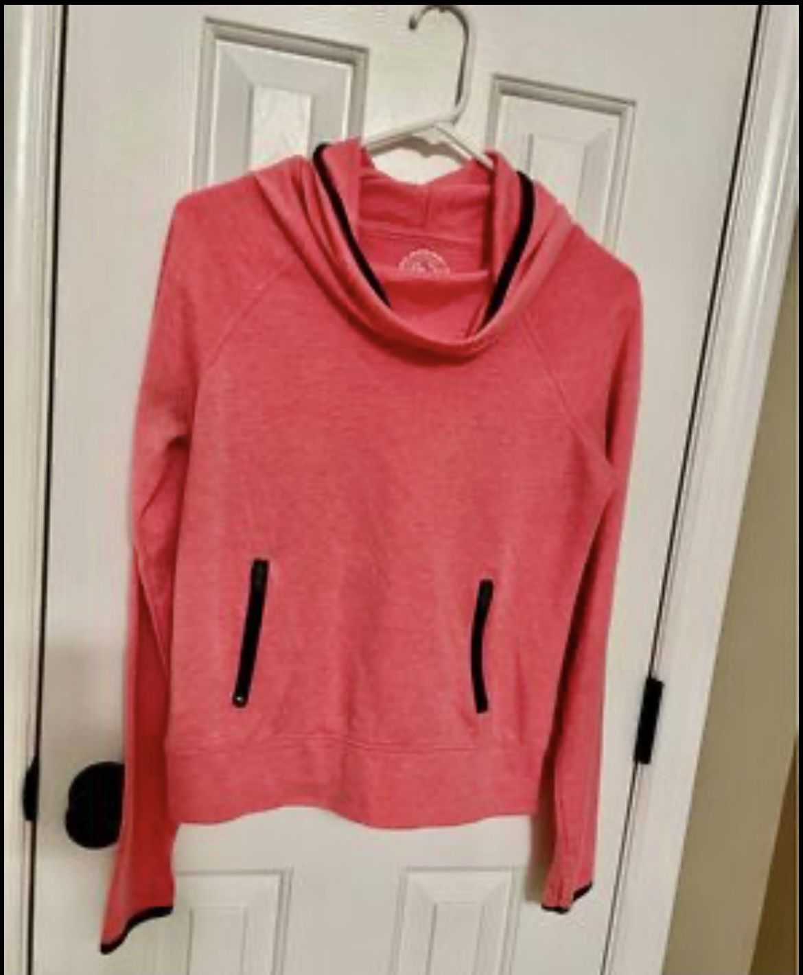 SO brand Girls Med size, soft feel, coral color outerwear. Hood, finger slits in sleeves. 2 zippers.