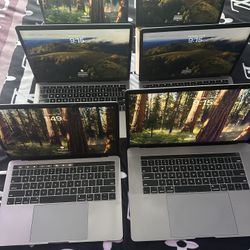 Six MacBooks
