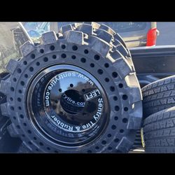 4 Solid Bobcat Tires 10-16.5 $2000 