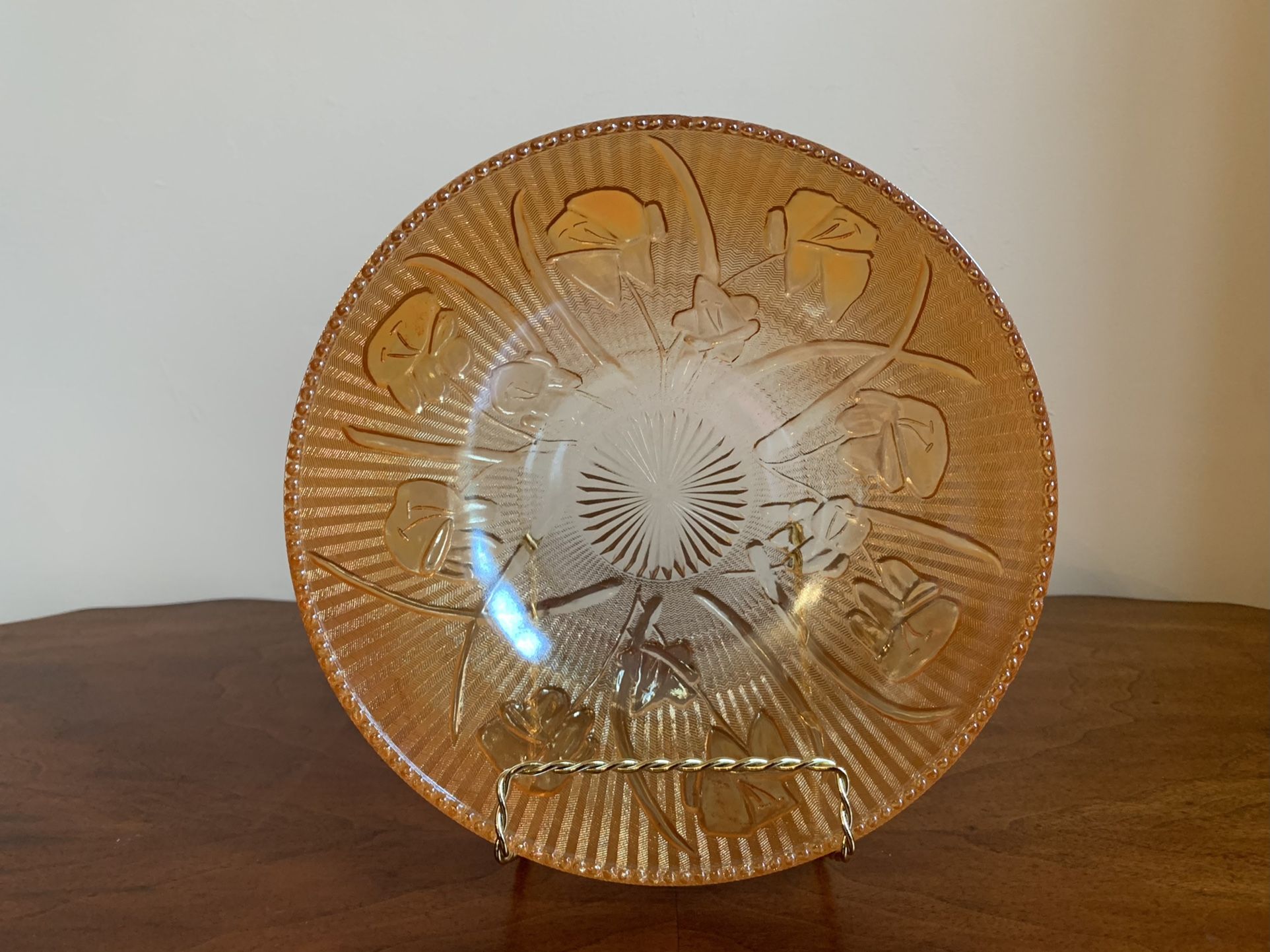 Jeanette iridescent Amber luster carnival glass bowl about 8” diameter x just over 2.5” tall