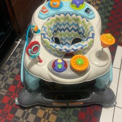 Baby Walker,rockers, both Side Have Activities Price 25$.  Pick Up. E.  Side.  Tacoma 