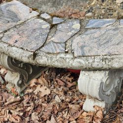 Outdoor concrete bench  has small crack but otherwise it's in good shape