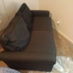 Black Love seat sleeper .Excellent  condition