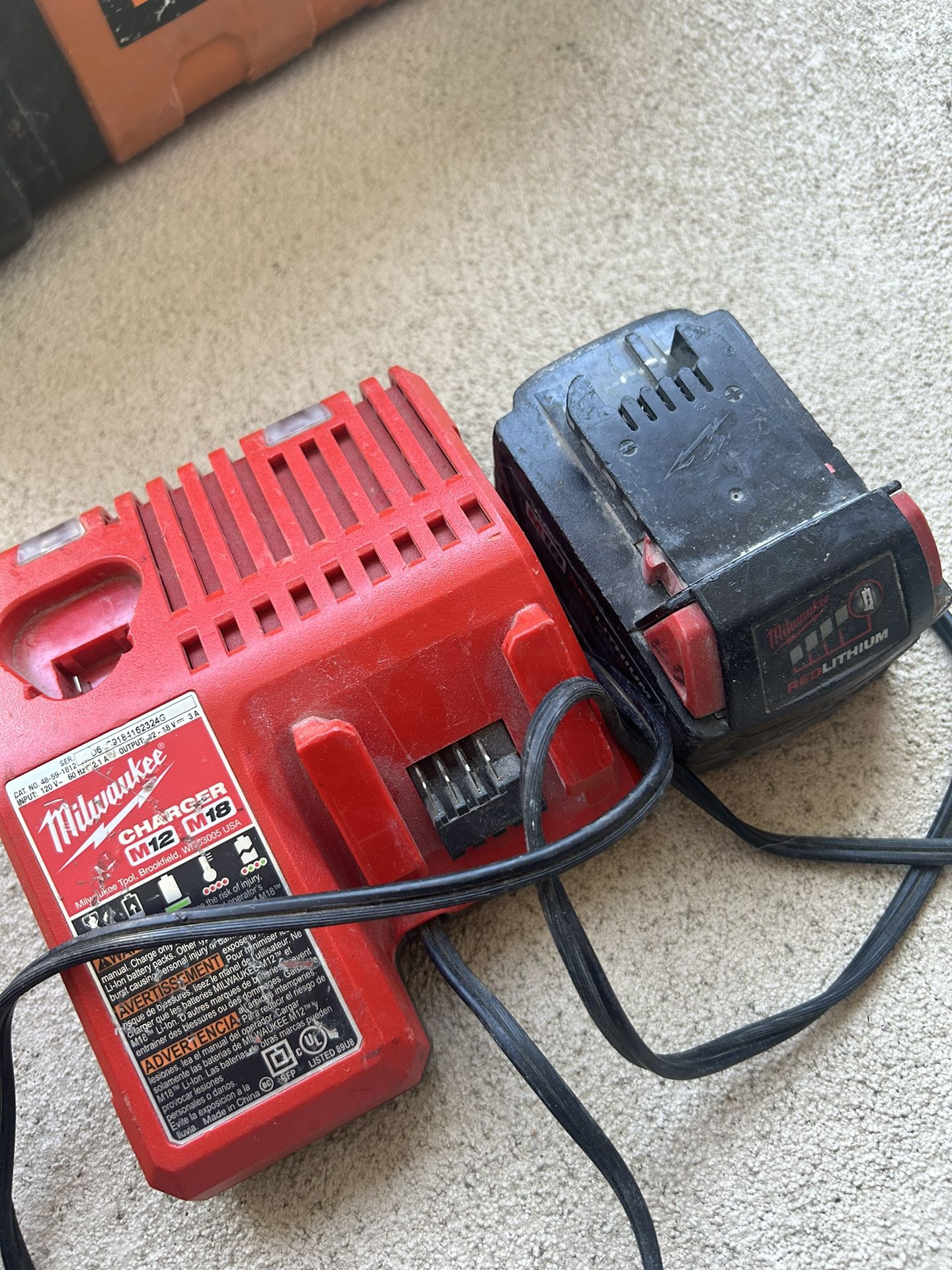 Milwaukee Battery Charger + Battery