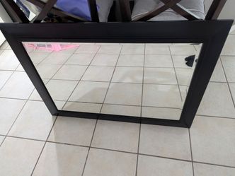 Mirror with black wood frame