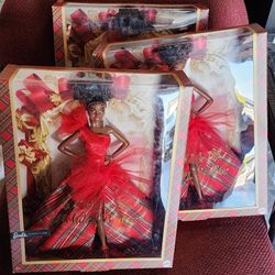 3 Holiday Barbie Dolls