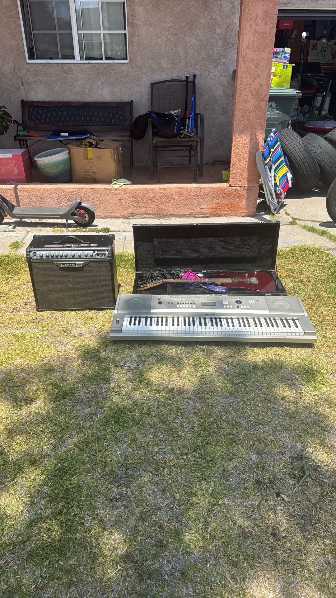 Keyboard, Electric Guitar, And Amp