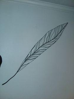 Black metal frame leaf