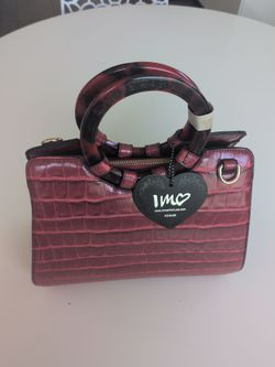 Brand new red hand bag