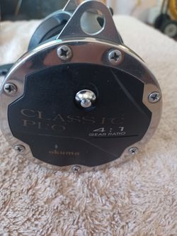 OKUMA, Exelentes Condiciones,$40, Dls. 