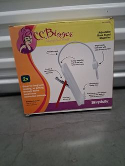 Adjustable book stand magnifier