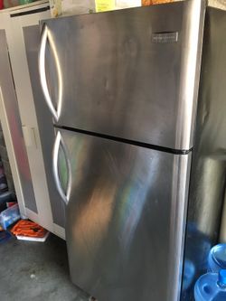 Frigidaire stainless steel refrigerator (will help with DELIVERY )