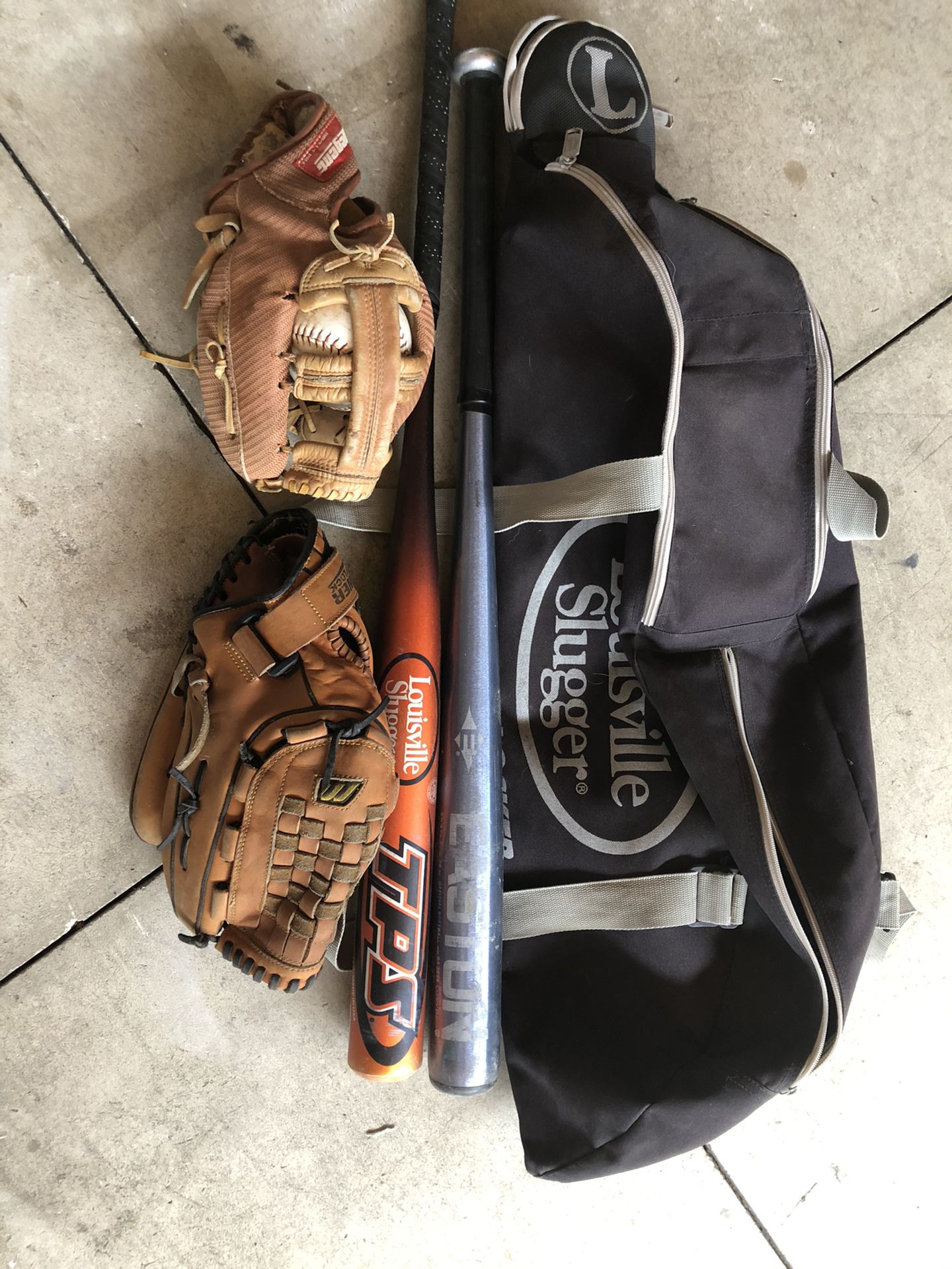 Softball bats and gloves