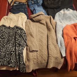 Bag of womens clothes mix of sizes.Pants,Sweaters,T-shirts
