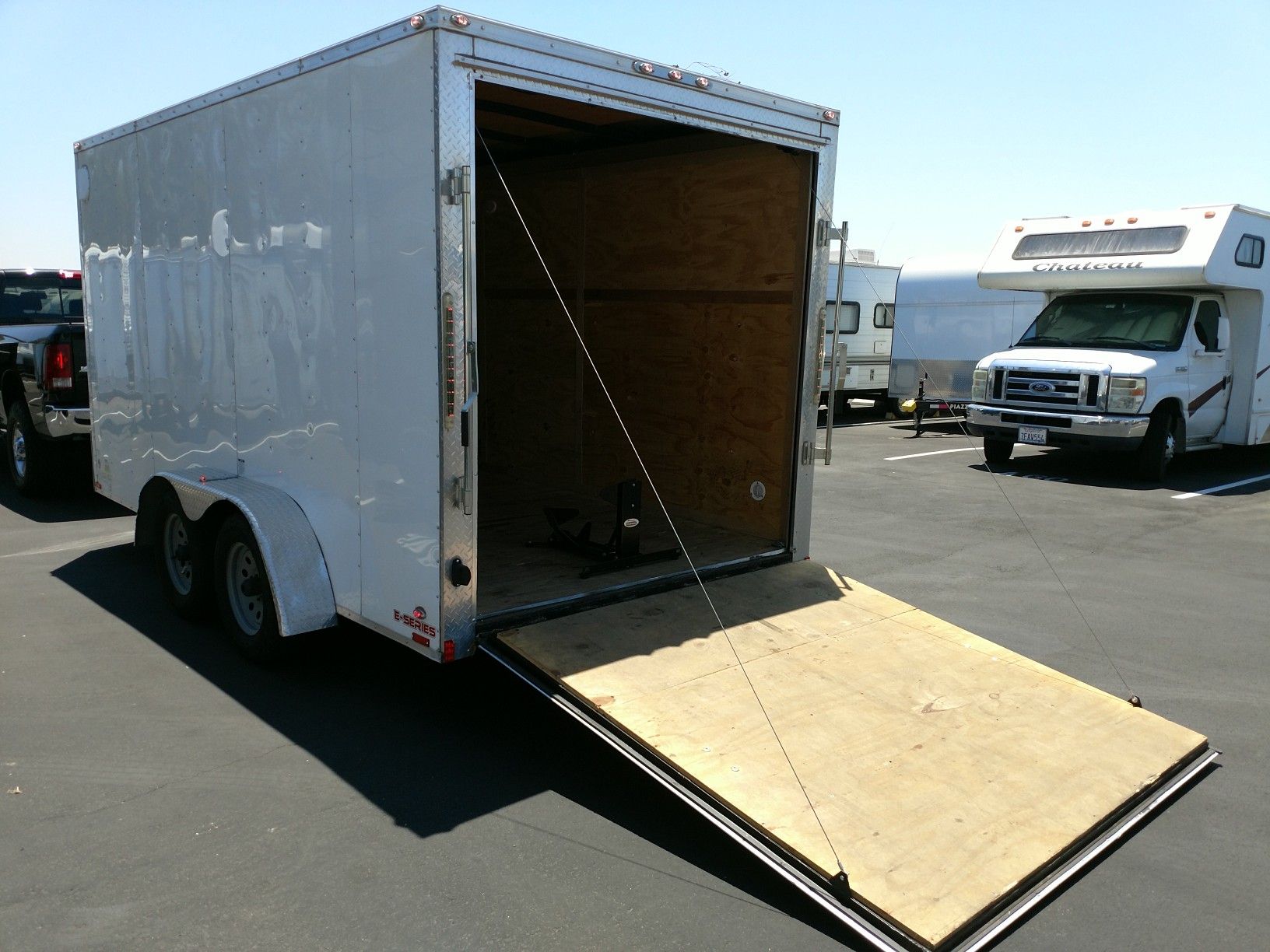 14' enclosed rental trailer. 7' wide x 6.5' tall. Side door + 4 D rings in floor. $120/ day.