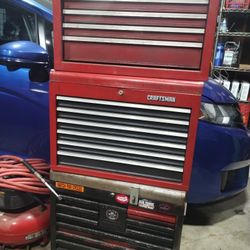 Three Tool Boxes And An Air Compressor
