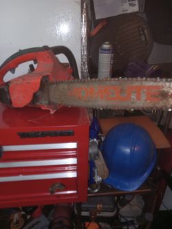 Vintage craftsman gas chain saw.