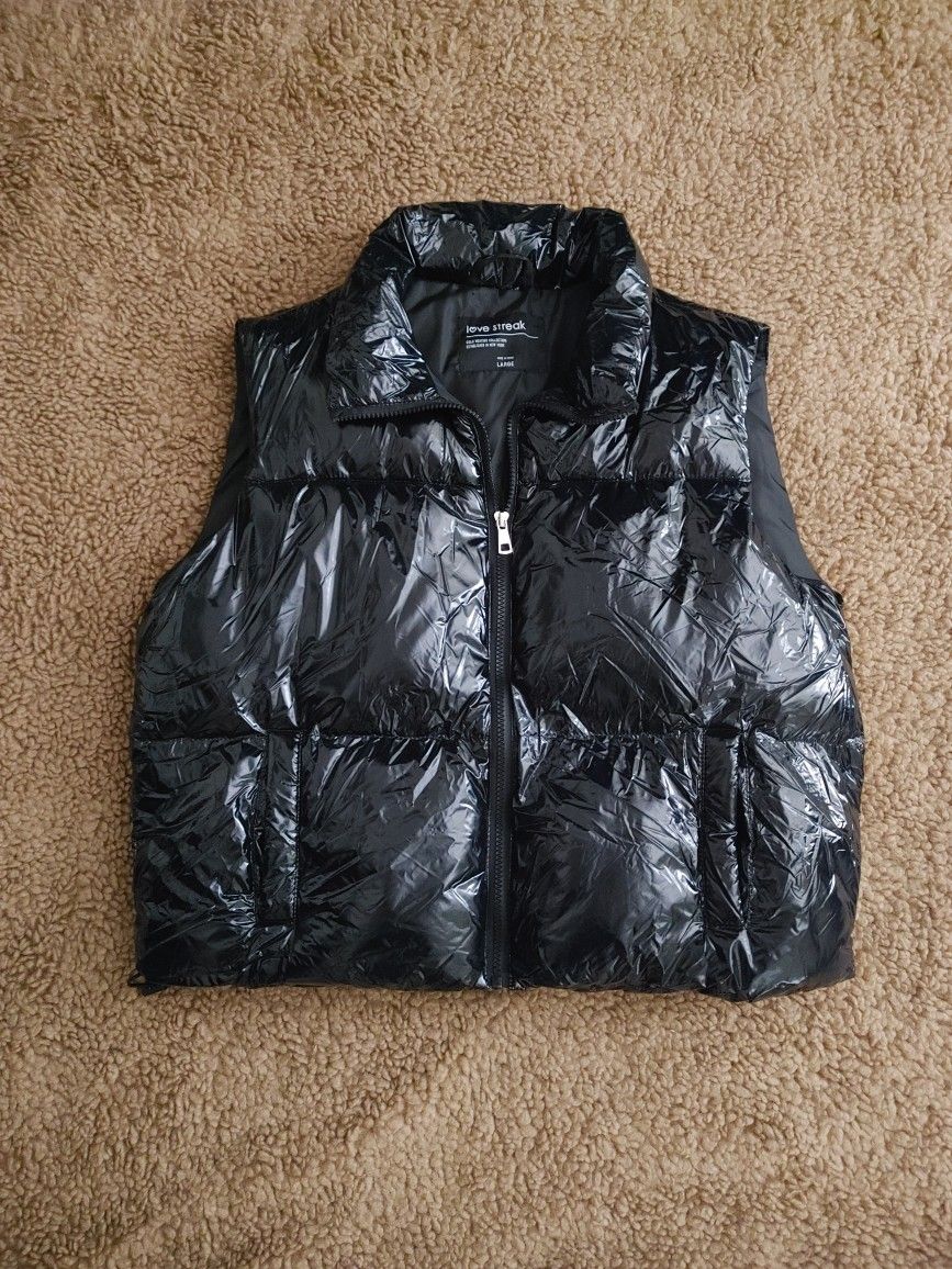 Love streak shiny black puffer vest. 