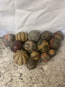  14 Decorative Resin Balls 2.5 and 4 inches. Couple of them have some cracks and chipped. See pictures attached