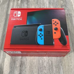 Brand New Nintendo Switch - Neon Blue and Neon Red Joy-Con