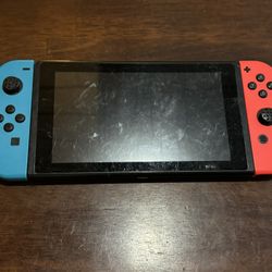 Nintendo Switch With Red And Blue Joycons Console