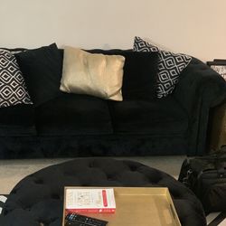 Black Sofa and Ottoman 