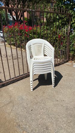 Six outdoor white chairs clean great condition comfortable they stuck each other easy to storage ready for summer