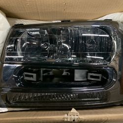 02-09 chevy trail blazer amber smoked headlights
